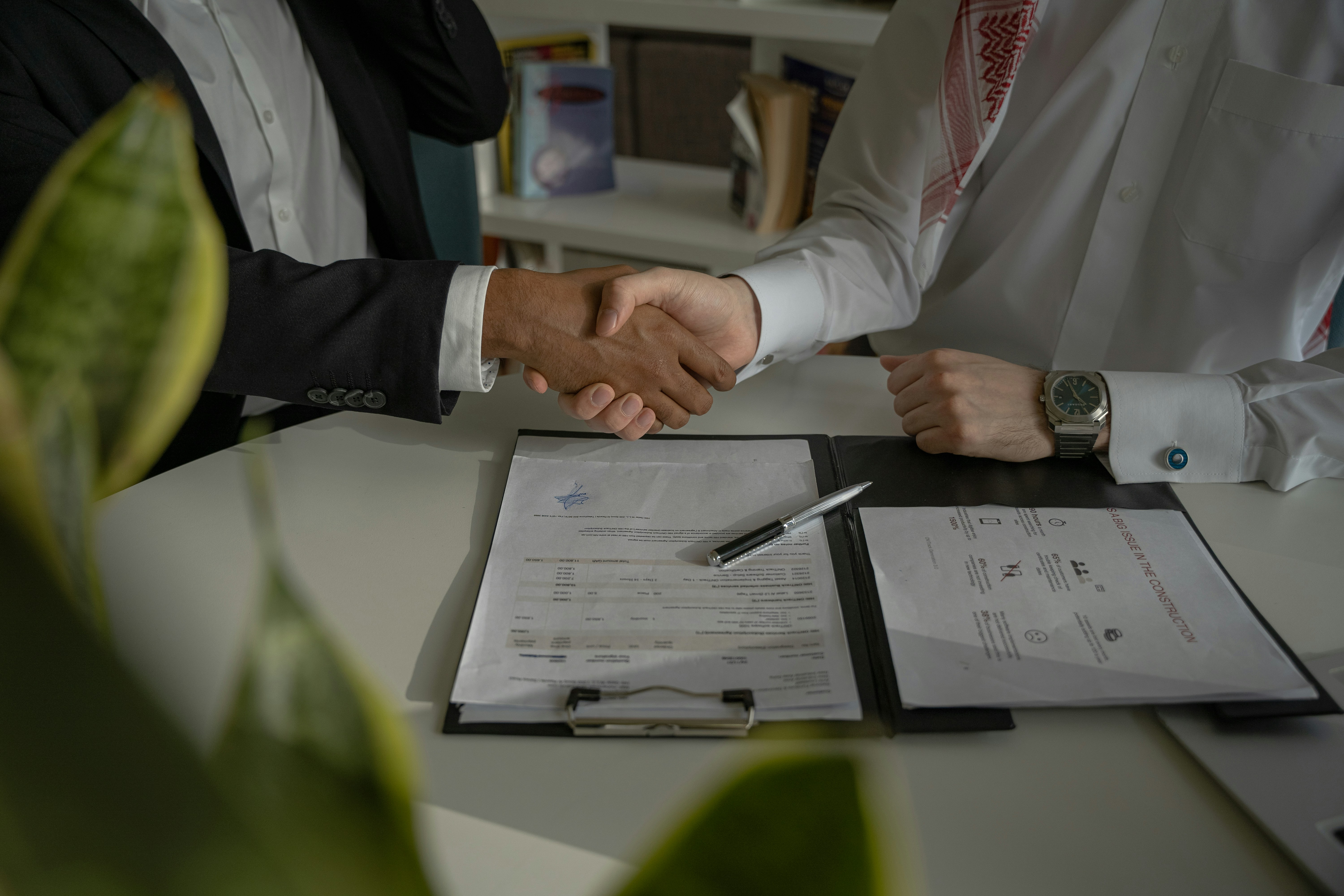 Business partnership handshake